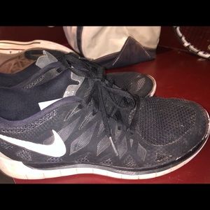 Nike black sneakers worn